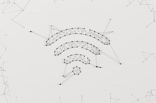Wifi symbol made in low polygonal style over light background